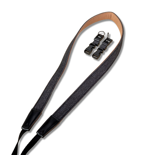 Camera strap with quick-release clasp on a white background