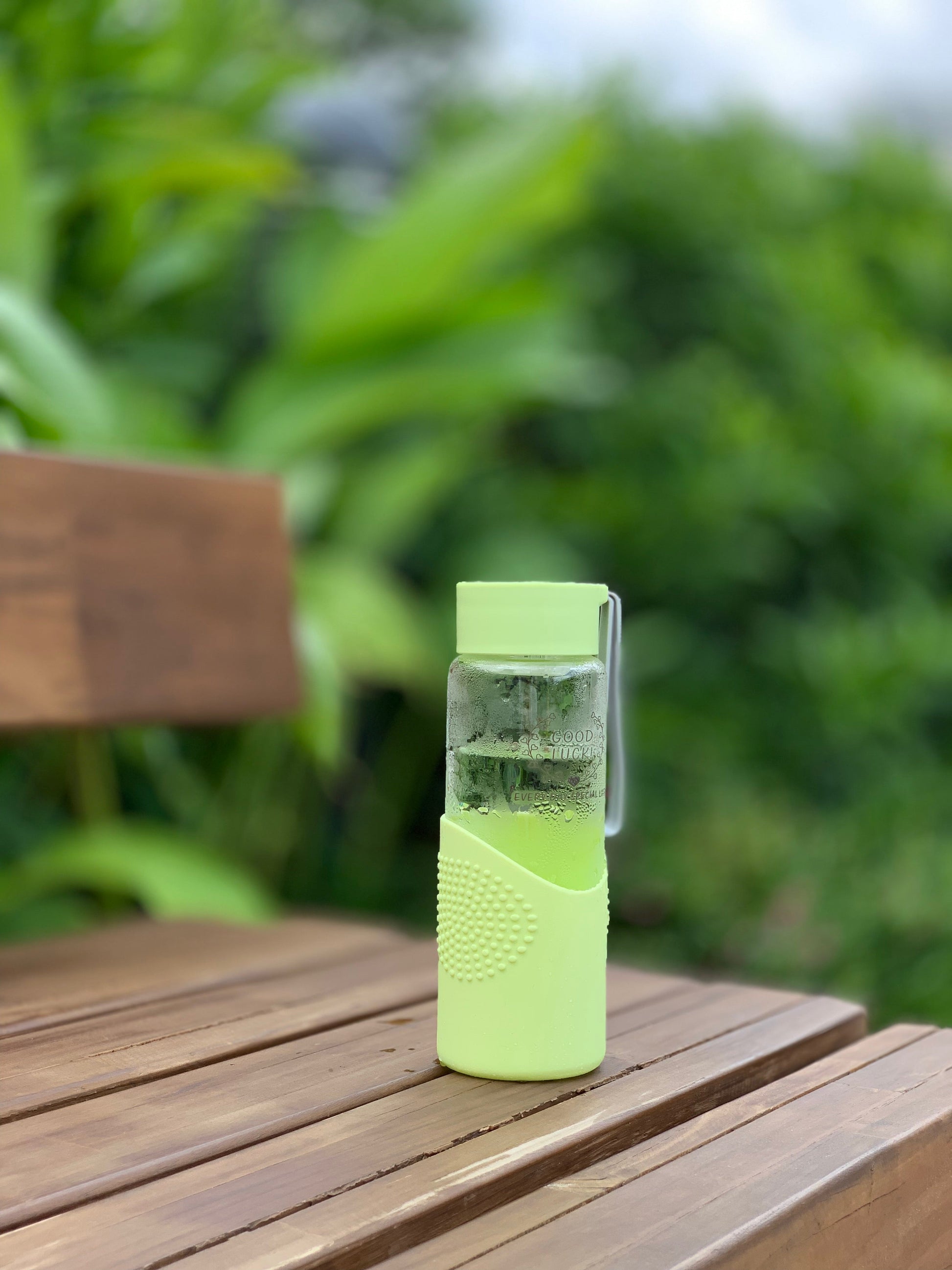 https://starcopia.com/cdn/shop/products/350ml-glass-water-bottle-with-silicone-sleeve-929095_1946x.jpg?v=1661502351